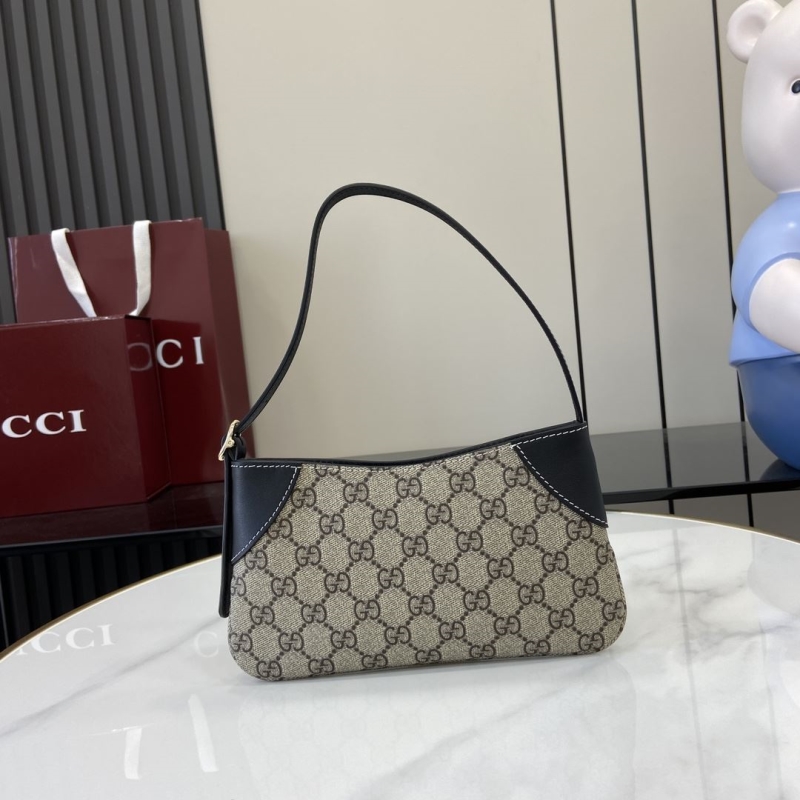 G*u*i top handle bags